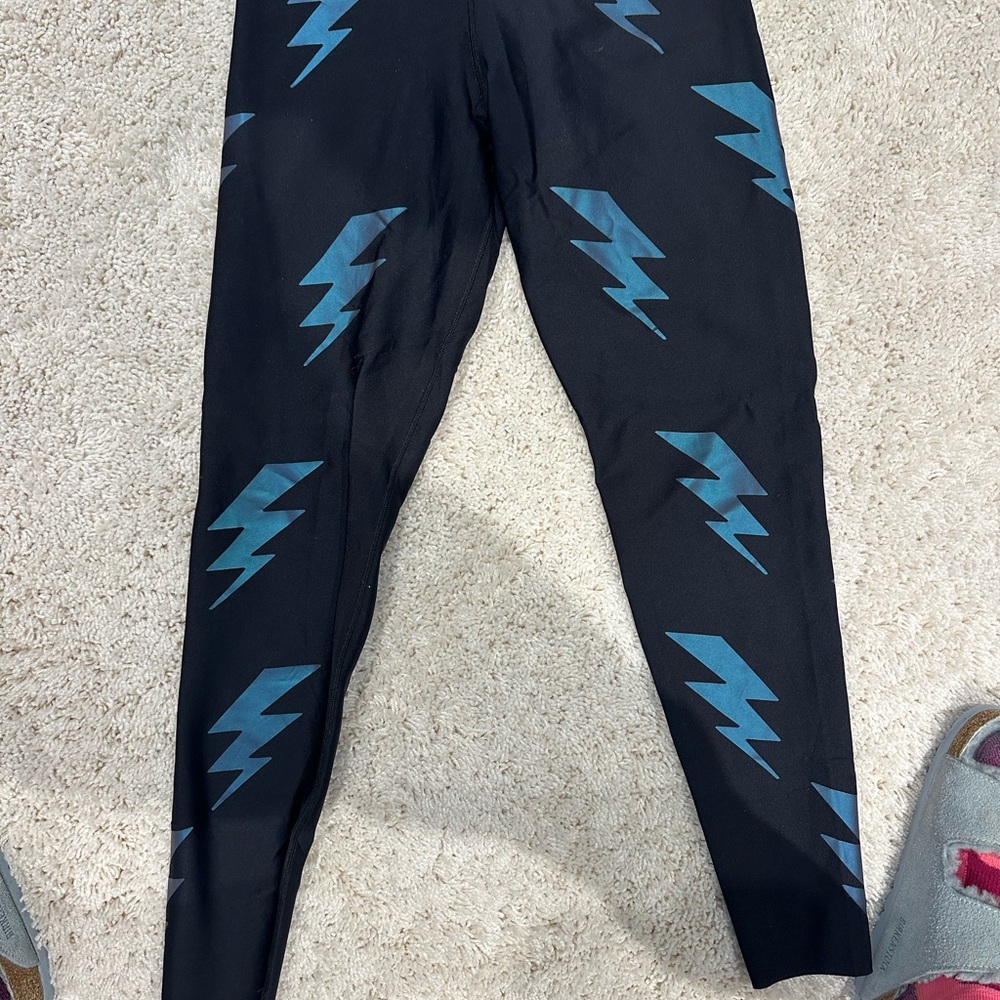Ultra core high rise compression leggings with opalescent foil bolts.small